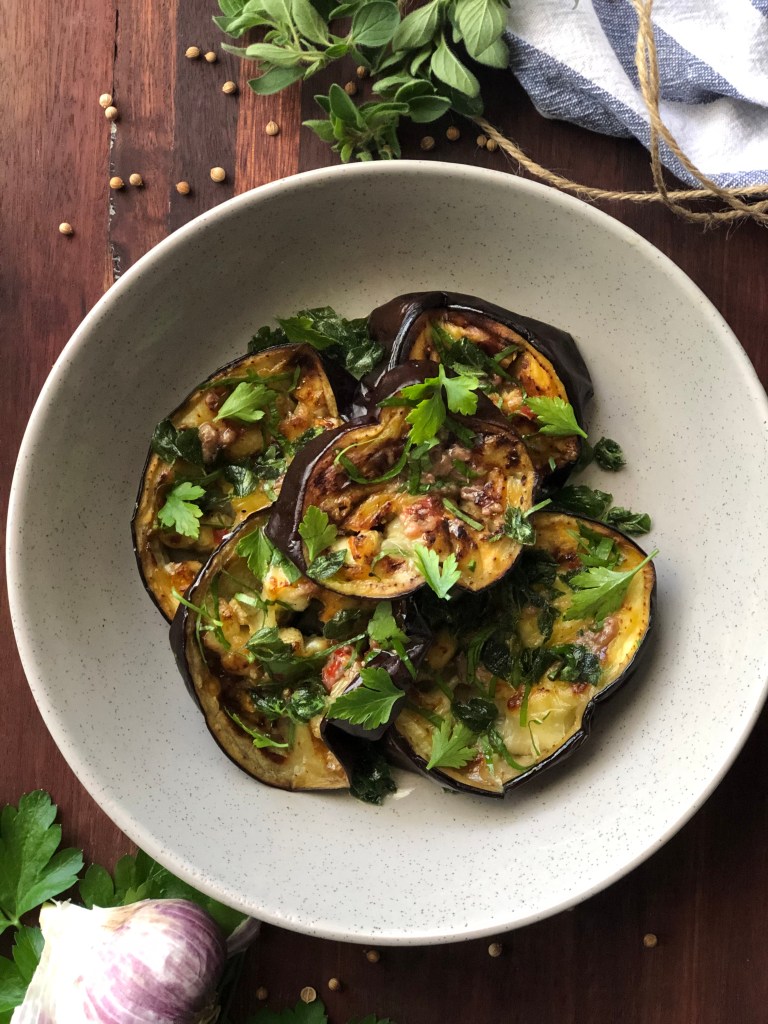 Roasted eggplant with anchovy dressing and crispy oregano